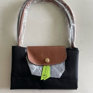 Longchamp Black and Brown Shoulder Bags with Structured Design